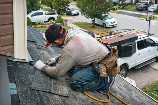 Professional Flat Roof Repair technician working in Fate, TX